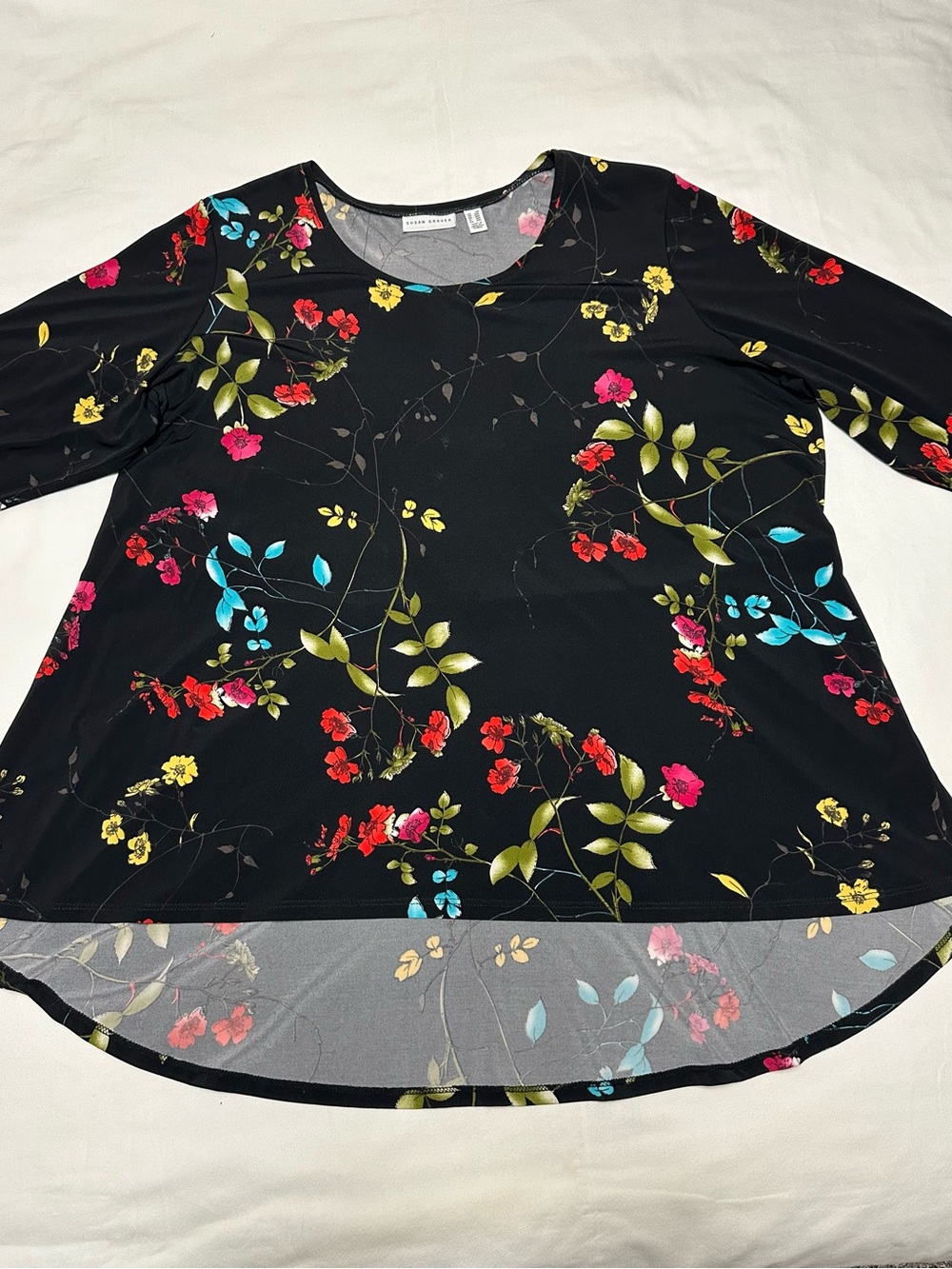 Sudan Graver  Women’s Black Floral Scoop-Neck Top With High-Low Hem.